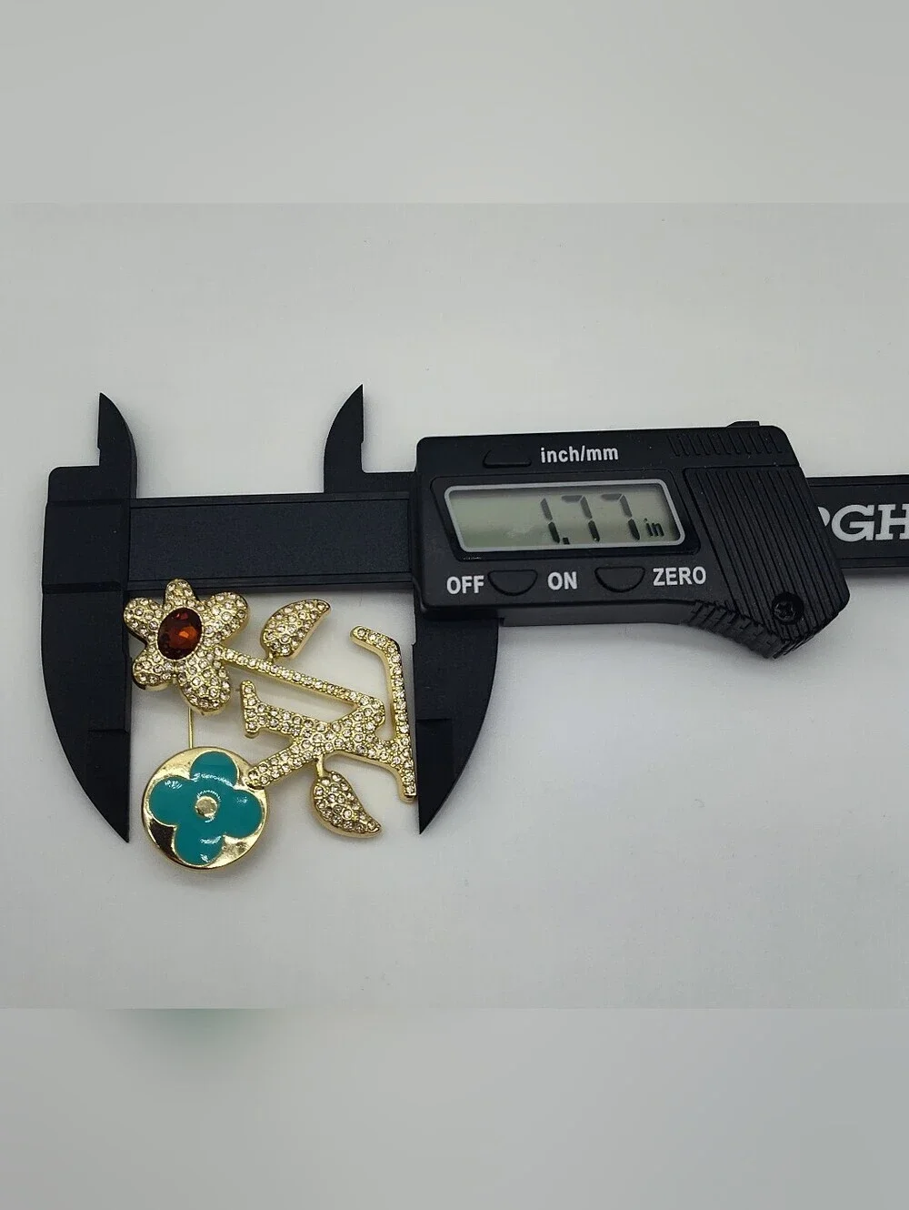 LOUIS VUITTON Crystal LV Flower Brooch GoldTone Turquoise Red Zipper Hardware
